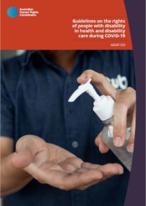 Cover page of AHRC disability and COVID-19 guidelines. Includes a photograph of a health worker using hand sanitiser.